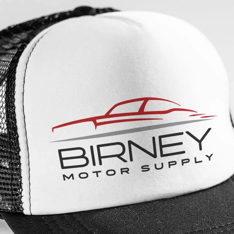 Close-up of black and white trucker hat from Birney Motor Supply